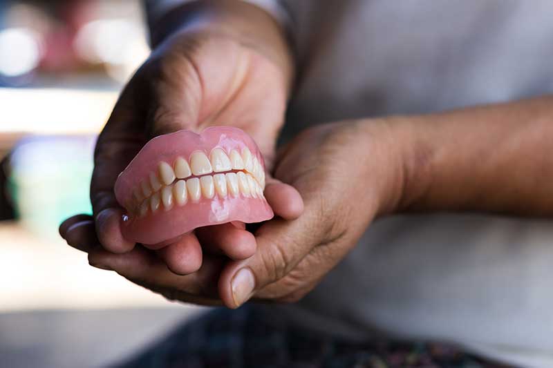 Mobile Dentist Cleaning Teeth